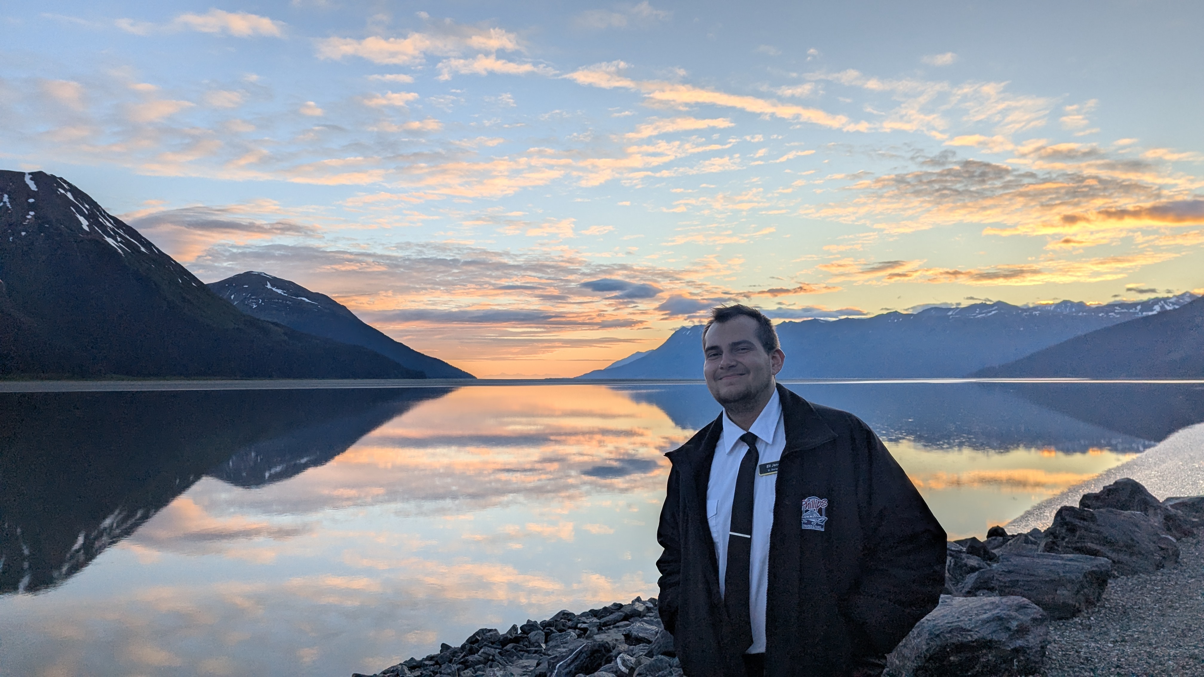 Elijah Jensen on the Alaskan coast at sunset