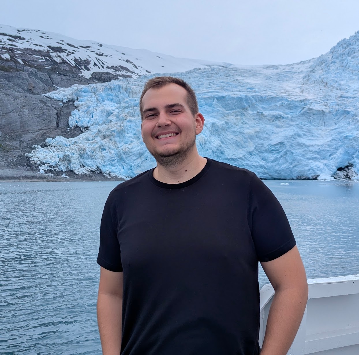 Elijah in front of a tidewater glacier in Alaska